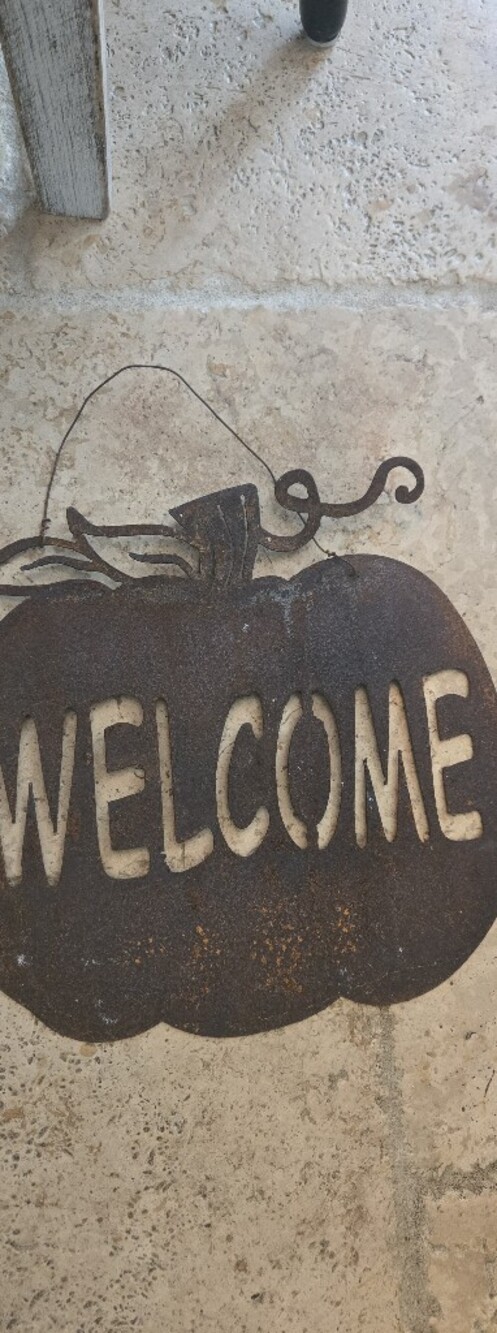 Rusted Iron Walcome Sign